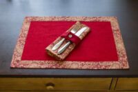 Classic Red Linen Placemat with Gold Paisley Border