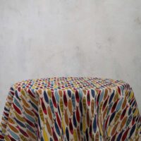 Round linen tablecloth in colorful fish pattern