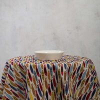 Round linen tablecloth in colorful fish pattern