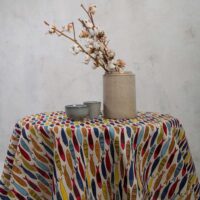 Round linen tablecloth in colorful fish pattern