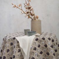 Round linen tablecloth in sheep pattern