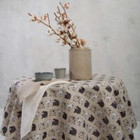 Round linen tablecloth in sheep pattern